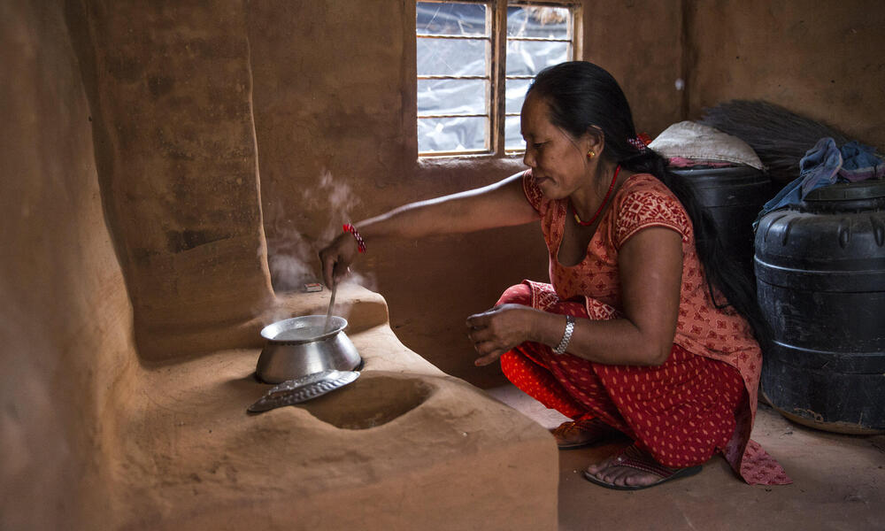 A woman at a cook stove in Nepal
