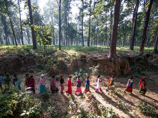 women walk in Nepal forest