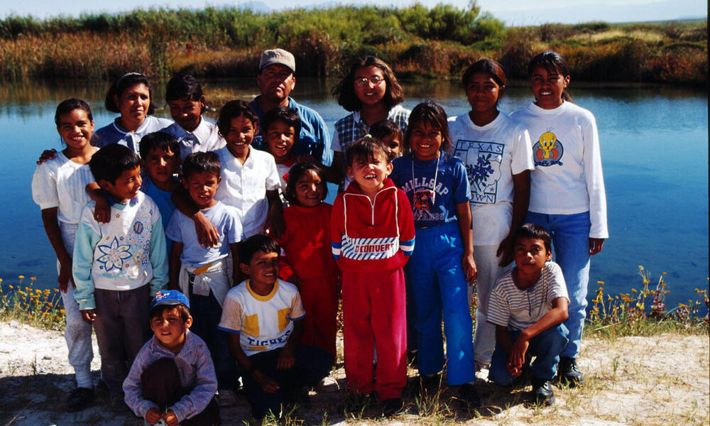 Children from one of the (Ejidos) communal farms visit Cuatrocienigas wetland pools to learn about their local environment Chihuahua Desert, Mexico