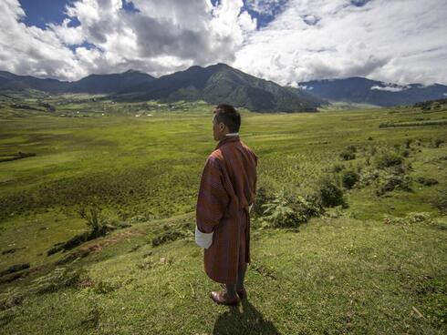 Tashi Dorji stands in Bhutan’s Phobjikha Valley