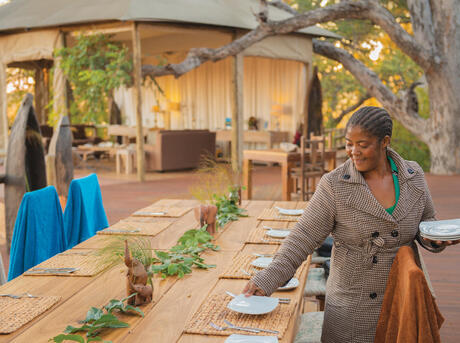 Catherine Mafumelo waitresses at Nambwa Lodge, a joint venture with Mayuni Conservancy in Bwabwata National Park. Namibia’s lodges create employment opportunities for community members and provide financial support for conservation efforts.