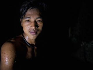 Feri, a honey famer from Talang Mamek tribe in Thirty Hills, Sumatra