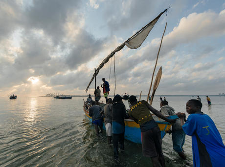 fisherman prepare for the days net fishing from their dow near Palma, Mozambique